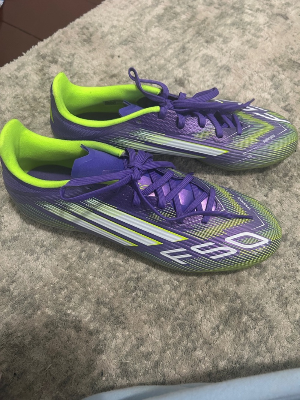 Purple and Neon Green Soccer Cleats